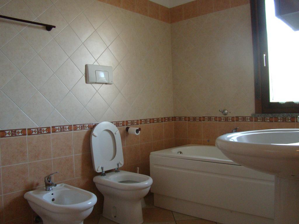 Appartamento Deledda Muravera Zimmer foto